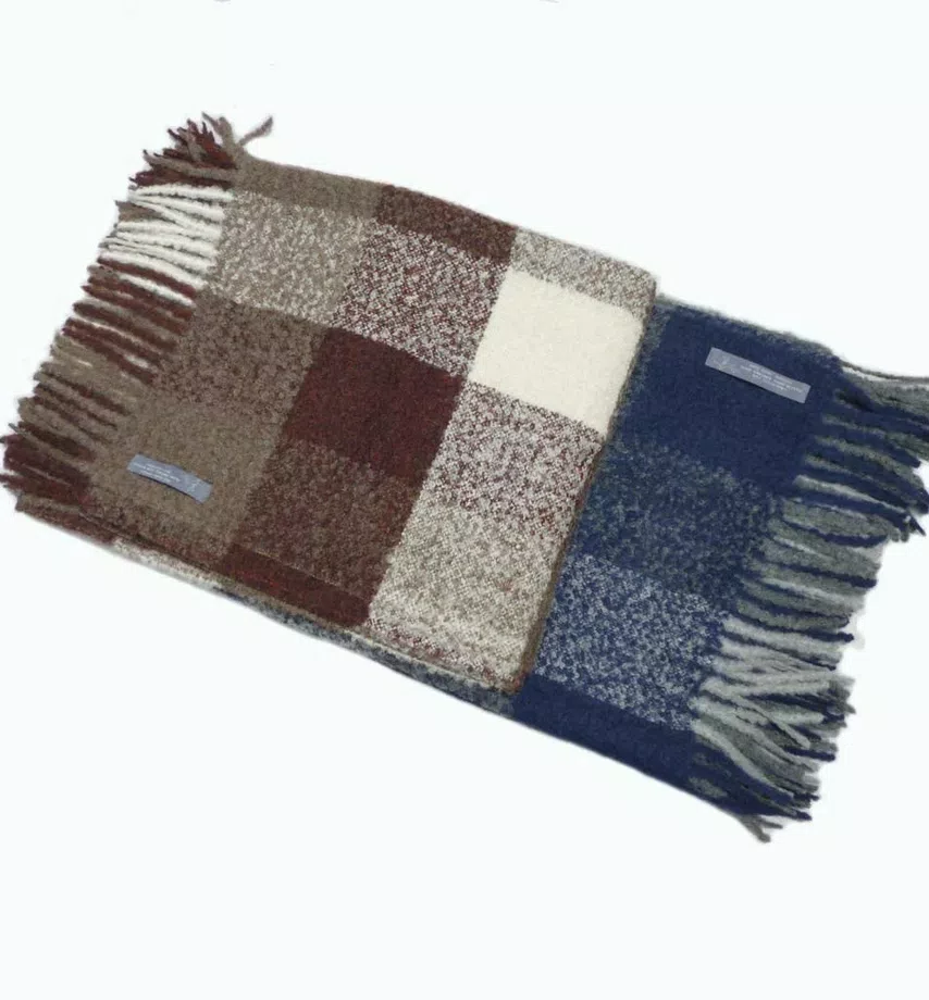 Enjoy your trip with our Baby Alpaca Travel Throw